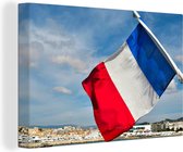 Canvas Schilderij Franse vlag met uitzicht op Cannes - 90x60 cm - Wanddecoratie