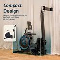 Compacte roeimachine met blauwe accenten, getoond in een woonkamer.