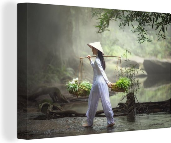 Canvas Schilderij Vietnamese vrouw loopt met groenten - 90x60 cm - Wanddecoratie