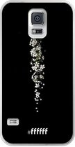 6F hoesje - geschikt voor Samsung Galaxy S5 -  Transparant TPU Case - White flowers in the dark #ffffff