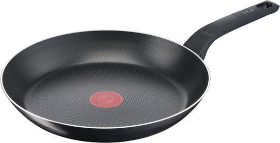 Zwarte koekenpan met rode Thermo-Spot, kleine puntjes en een witte rand.