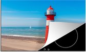 KitchenYeah® Inductie beschermer 81.2x52 cm - Rood met witte vuurtoren op het strand van Westkapelle in Zeeland, Nederland - Kookplaataccessoires - Afdekplaat voor kookplaat - Inductiebeschermer - Inductiemat - Inductieplaat mat