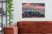 Canvas Schilderij Zonsondergang bij het nieuwe World Trade Center in Manhattan - 90x60 cm - Wanddecoratie