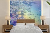 Behang - Fotobehang Wolken met een regenboog - Breedte 240 cm x hoogte 240 cm