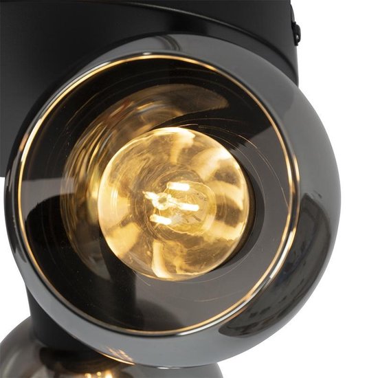 Close-up van een glimmende, grijze kogelvormige spot met een zichtbare gloeilamp.