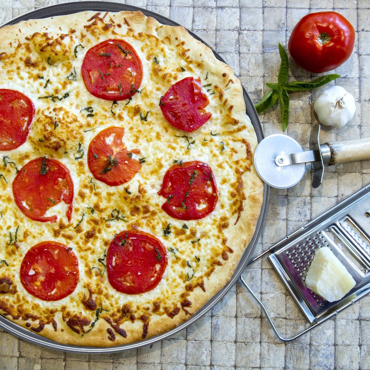 Plaque ronde pour cuisson pizza anti-adhésive de 16 à 36 cm PAQUET