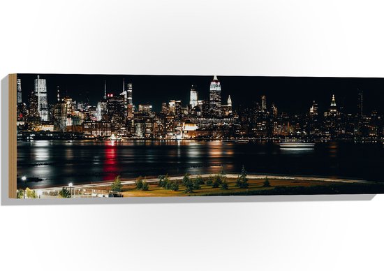 Hout - Skyline in New York in de Nacht - 90x30 cm - 9 mm dik - Foto op Hout (Met Ophangsysteem)