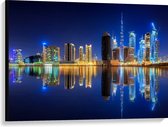 Canvas - Skyline van Dubai met Weerspiegeling in de Zee, Qatar - 100x75 cm Foto op Canvas Schilderij (Wanddecoratie op Canvas)