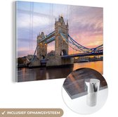 MuchoWow® Glasschilderij 150x100 cm - Schilderij acrylglas - Zonsopkomst bij de Tower Bridge in London - Foto op glas - Schilderijen