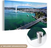 MuchoWow® Glasschilderij 80x40 cm - Schilderij acrylglas - Prachtige luchtfoto van Meer van Genève en de fontein - Foto op glas - Schilderijen