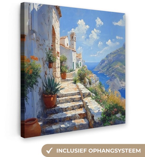 Een schilderij op canvas van een stenen trap, witte huizen en uitzicht op zee, met een sticker 'inclusief ophangsysteem'.