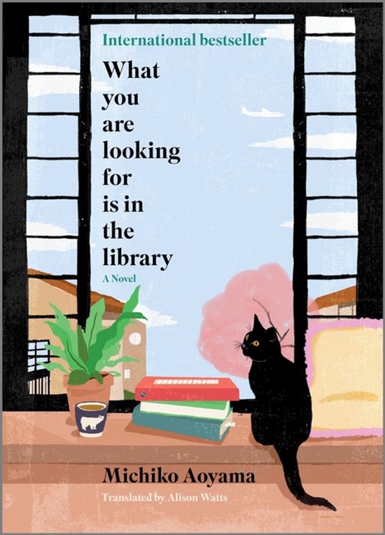 Boek 'What you are looking for is in the library' met een zwarte kat, boeken en plant bij een raam. Internationale bestseller.
