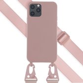 Selencia Hoesje Geschikt voor iPhone 12 Pro / 12 Hoesje Met Koord - Selencia Siliconen hoesje met afneembaar koord - roze