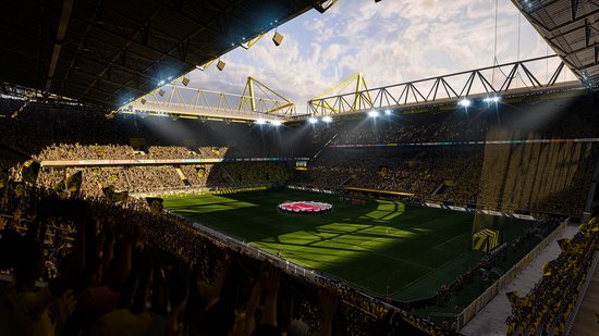 Voetbalstadion met veel gele sjaals en publiek, groen veld.