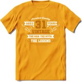 31 Jaar Legend T-Shirt | Goud - Wit | Grappig Verjaardag en Feest Cadeau Shirt | Dames - Heren - Unisex | Tshirt Kleding Kado | - Geel - L