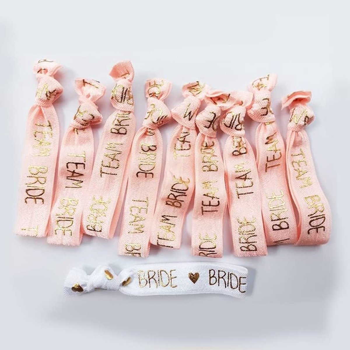 11x Bride-to-be armbanden - Vrijgezellenfeest armbandjes - Bruid armband - Team bride - Vrijgezellenfeest accessoires - Bachelorette - Bachelor party - Bride outfit - Feestdecoratie - Roze - Jonyx