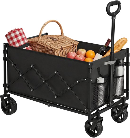 Zwarte bolderkar met picknickspullen: mand, flessen, fruit en een deken met rood-wit ruitpatroon.