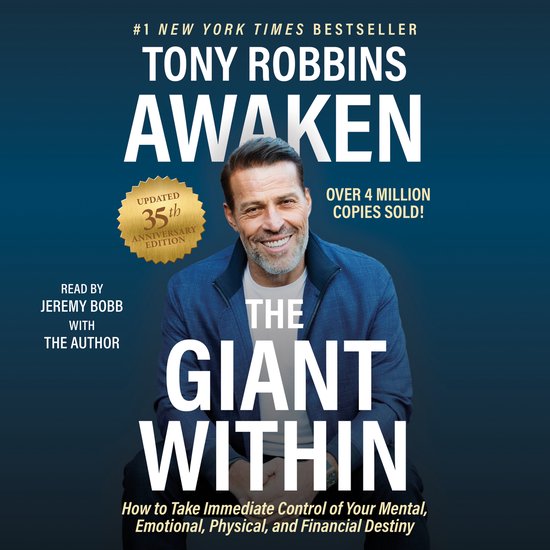 Couverture du livre : 'Awaken The Giant Within' de Tony Robbins, édition anniversaire mise à jour du 35e, avec Tony Robbins portant une veste bleue.