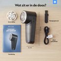 Inhoud van de doos: pluizenverwijderaar, extra snijkop, handleiding, reinigingsborstel, USB-C kabel.