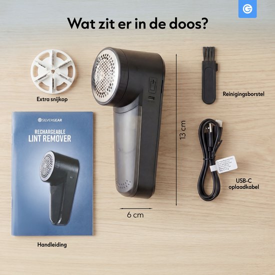 Inhoud van de doos: pluizenverwijderaar, extra snijkop, handleiding, reinigingsborstel, USB-C kabel.