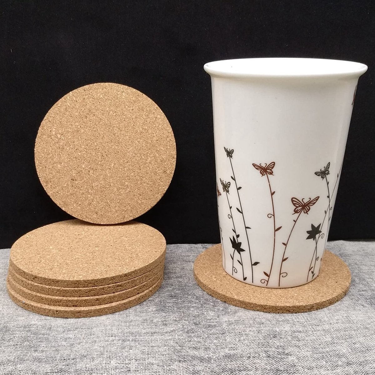 Dailygoody - Kurken Onderzetters - Antislip Onderzetters - Milieuvriendelijk - 9 cm - Ronde Onderzetters - Geschikt voor Thuis - Zwarte Opbergtas