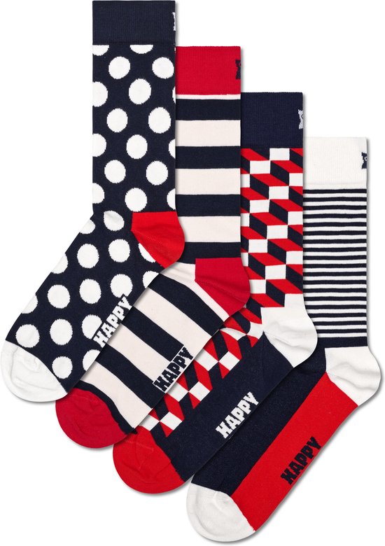 Vier Happy Socks met patronen: marineblauw met witte stippen, marineblauw met rode en witte strepen, rood met witte en marineblauwe blokken, en marineblauw met witte strepen.