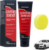 Fles met krasverwijderaar met spons en een witte auto op de achtergrond.