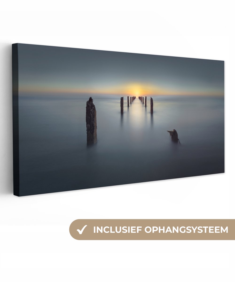 Canvas - Wanddecoratie - Zee - Zonsondergang - Palen - Landschap - 80x40 cm - Canvas schil