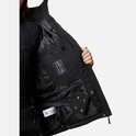 Binnenkant zwarte ski-jas met diverse vakken, waaronder een mesh vak. STX logo zichtbaar.
