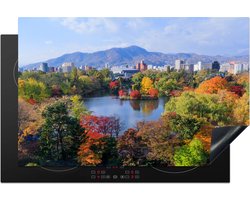 KitchenYeah® Inductie beschermer 81.2x52 cm - Herfst valt over het Odori Park in het centrum van Sapporo in Japan - Kookplaataccessoires - Afdekplaat voor kookplaat - Inductiebeschermer - Inductiemat - Inductieplaat mat