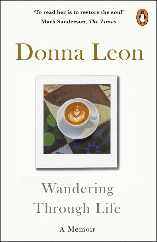 Couverture du livre 'Wandering Through Life' de Donna Leon, avec une photo d'une tasse de café avec latte art.