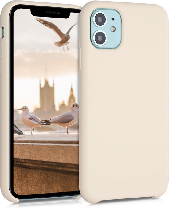 Een lichtgekleurd telefoonhoesje voor een iPhone 11, staand naast de telefoon. Het scherm toont een foto van de London skyline met vogels.