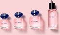 Drie Giorgio Armani My Way parfumflesjes met blauwe dop en een groter flesje naast elkaar.