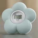 Lichtgroene Philips Avent bloemvormige thermometer. Toont 18.0°C.