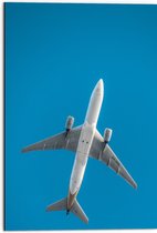 WallClassics - Dibond - Onderkant van Vliegtuig bij Blauwe Lucht - 50x75 cm Foto op Aluminium (Wanddecoratie van metaal)