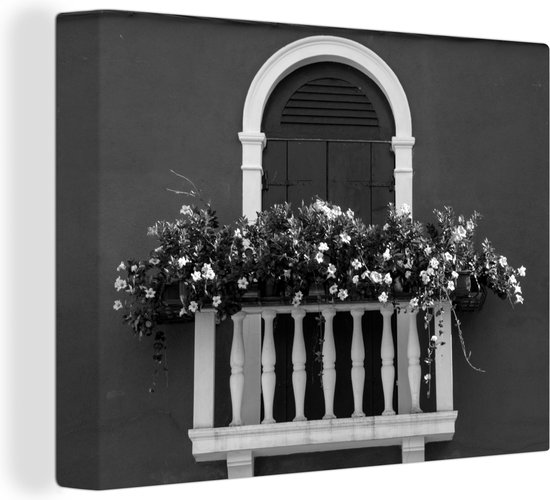 Canvas Schilderij Groot raam met een grote bos bloemen ervoor - zwart