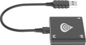 Zwarte adapter met logo, gebogen USB-kabel en pictogrammen voor games en muis.