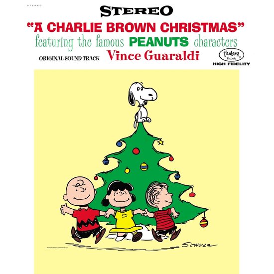 Pochette d'album "A Charlie Brown Christmas" avec Charlie Brown, Lucy, Linus et Snoopy autour d'un sapin de Noël.
