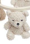 Lichtbeige teddybeer mobiel met schattig gezicht en krullend bont.