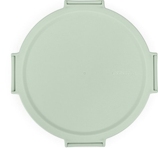 Boîte à salade verte jade fermée avec clips de fermeture carrés, vue de dessus.