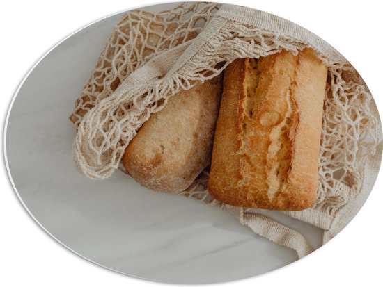 PVC Schuimplaat Ovaal - Verse Broodjes in Gehaakt Tasje - 56x42 cm Foto op Ovaal (Met Ophangsysteem)