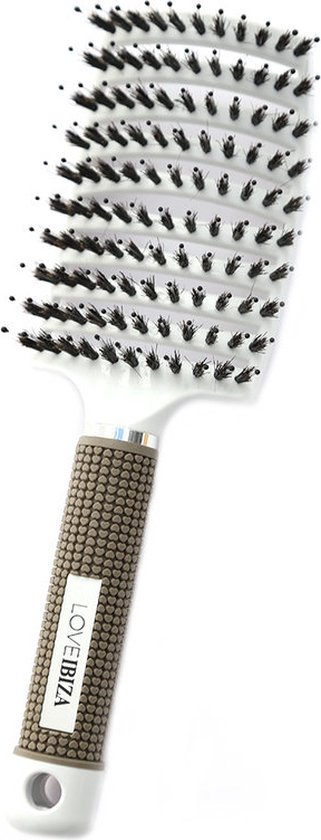 Brosse à cheveux blanche Love Ibiza avec manche beige à pois marron. Texte 'LOVE IBIZA' sur le manche.