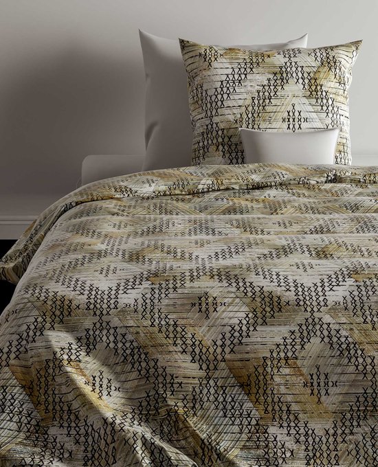Housse de couette et taies d'oreiller avec motif géométrique vert, beige et noir. Ressemblent à un filet de pêche.