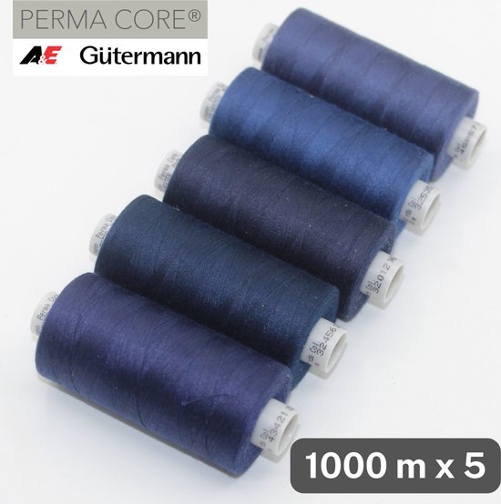 Vijf spoelen Gütermann Perma Core polyester garen in verschillende blauwtinten. 1000 m x 5.