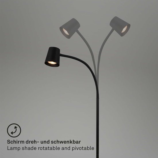 Zwarte staande lamp met draaibare en kantelbare lampenkap.