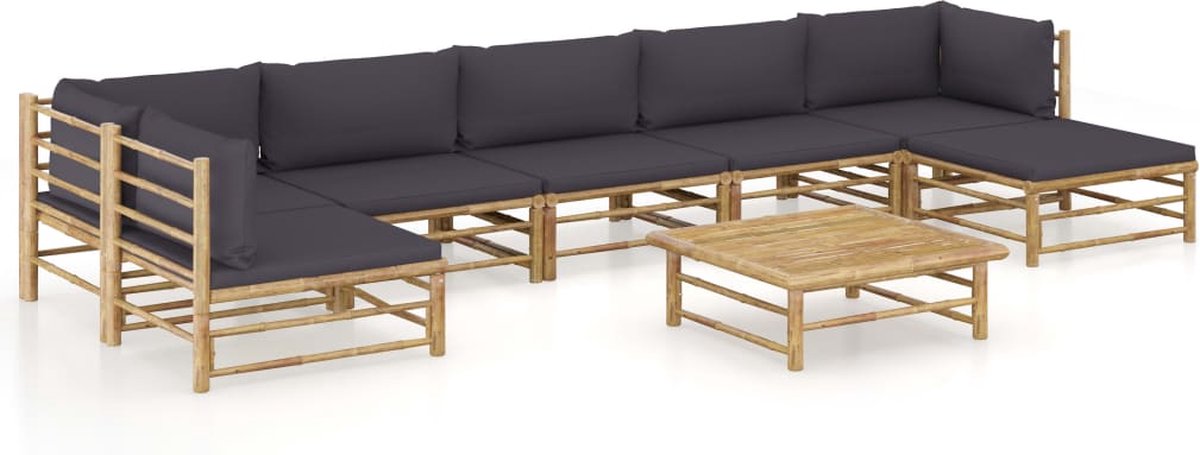 Bamboe loungestoel met donkergrijze kussens voor buitendiner en tuinlounge.
