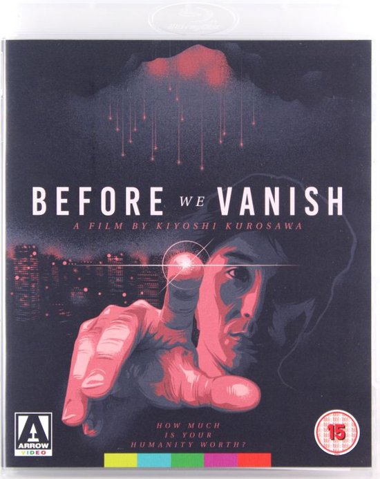 Voorpagina van de Blu-ray: "Before We Vanish" met een man die met zijn vinger naar een lichtpunt reikt. Stadsgezicht op de achtergrond.