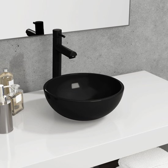 Lavabo rond noir.