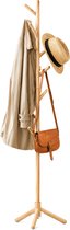 Houten staande kapstok met beige jas, strooien hoed en bruine leren tas.