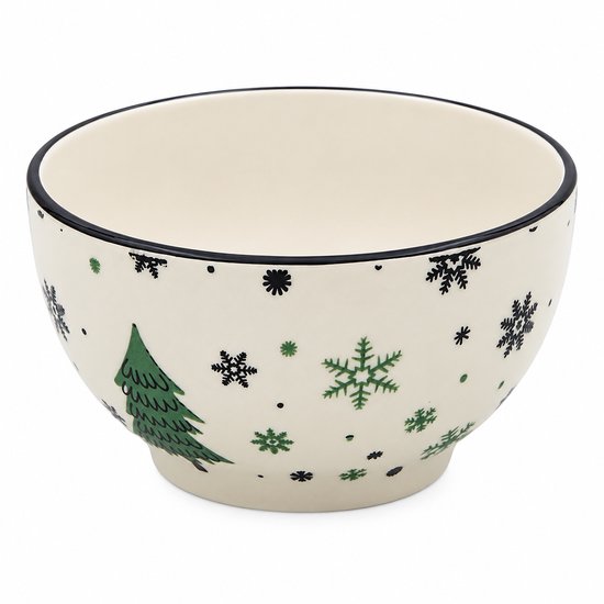 Witte kom met kerstboom en groene en zwarte sneeuwvlokken. Zwarte rand.